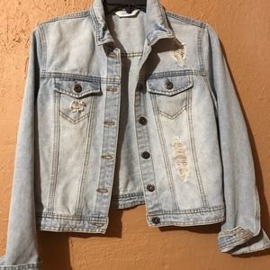 Distressed denim jacket